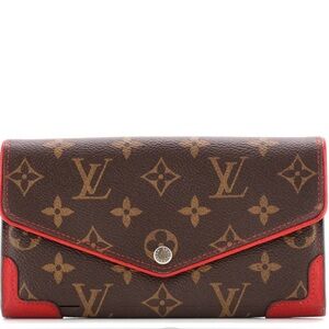 LOUIS VUITTON
MONOGRAM CANVAS SARAH RETIRO WALLET